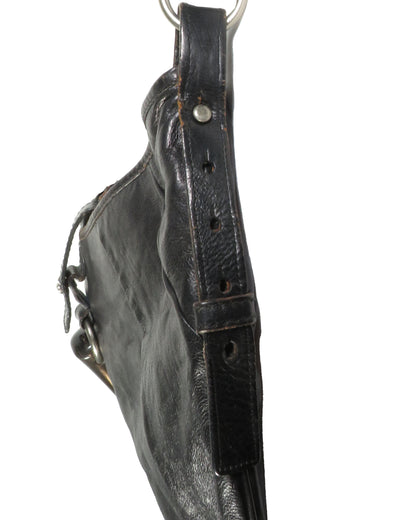 Black leather bag with a strap on a white background