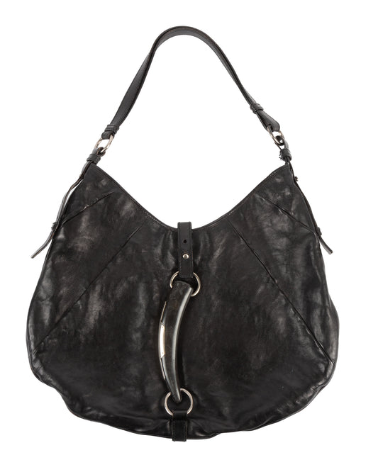 Black leather Yves Saint Laurent Mombasa hobo bag with a signature horn decoration and silver-tone metal rings.