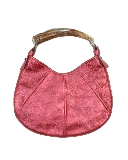 Pink handbag with wooden handle on a white background. Yves Saint Laurent by Tom Ford Metallic Red Small Mombasa Bag - vothe archive - curated designer vintage 