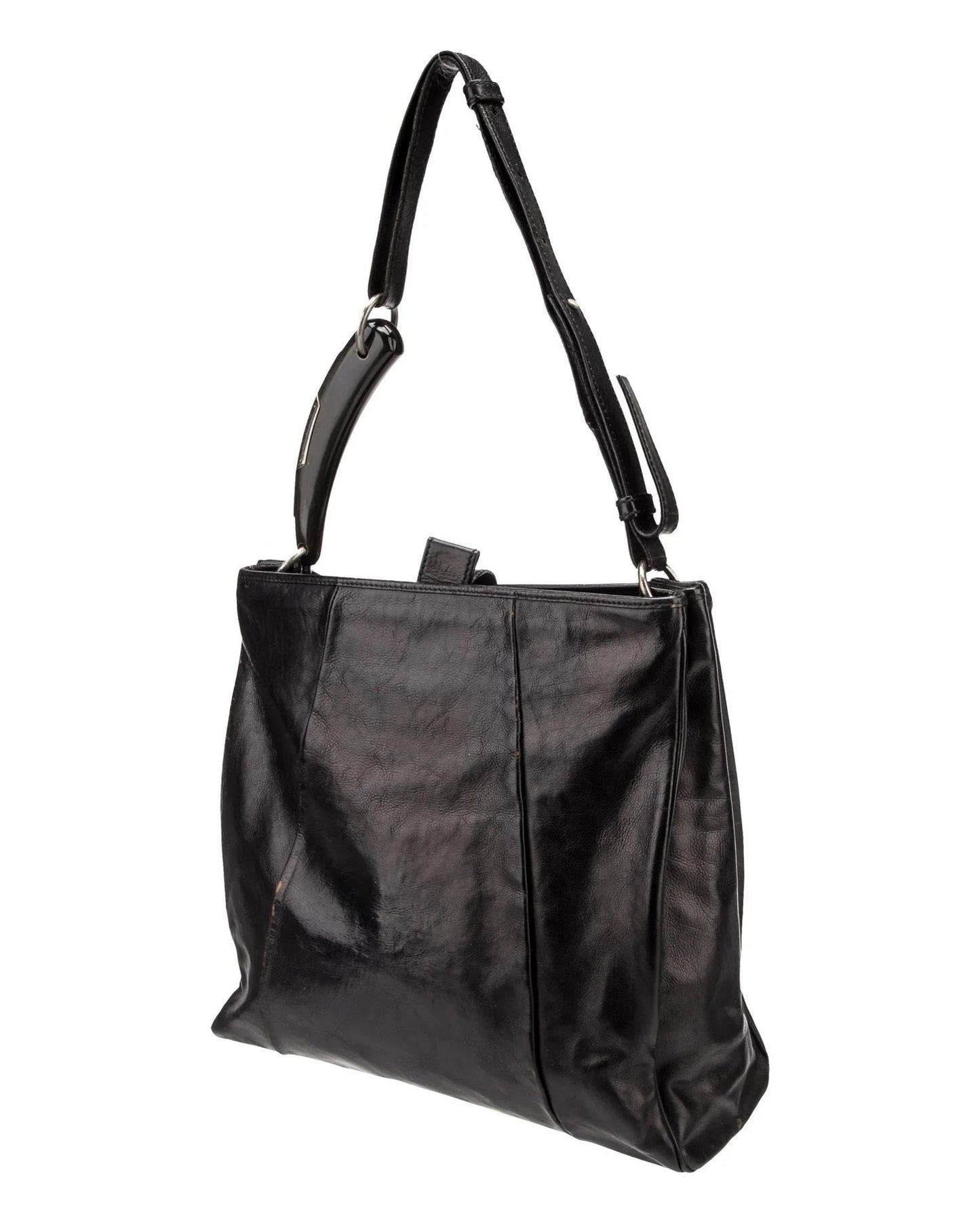 Black handbag with a shoulder strap on a white background