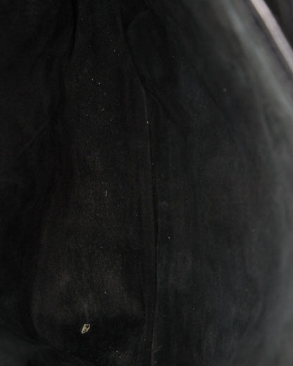 Close-up of a textured black fabric surface